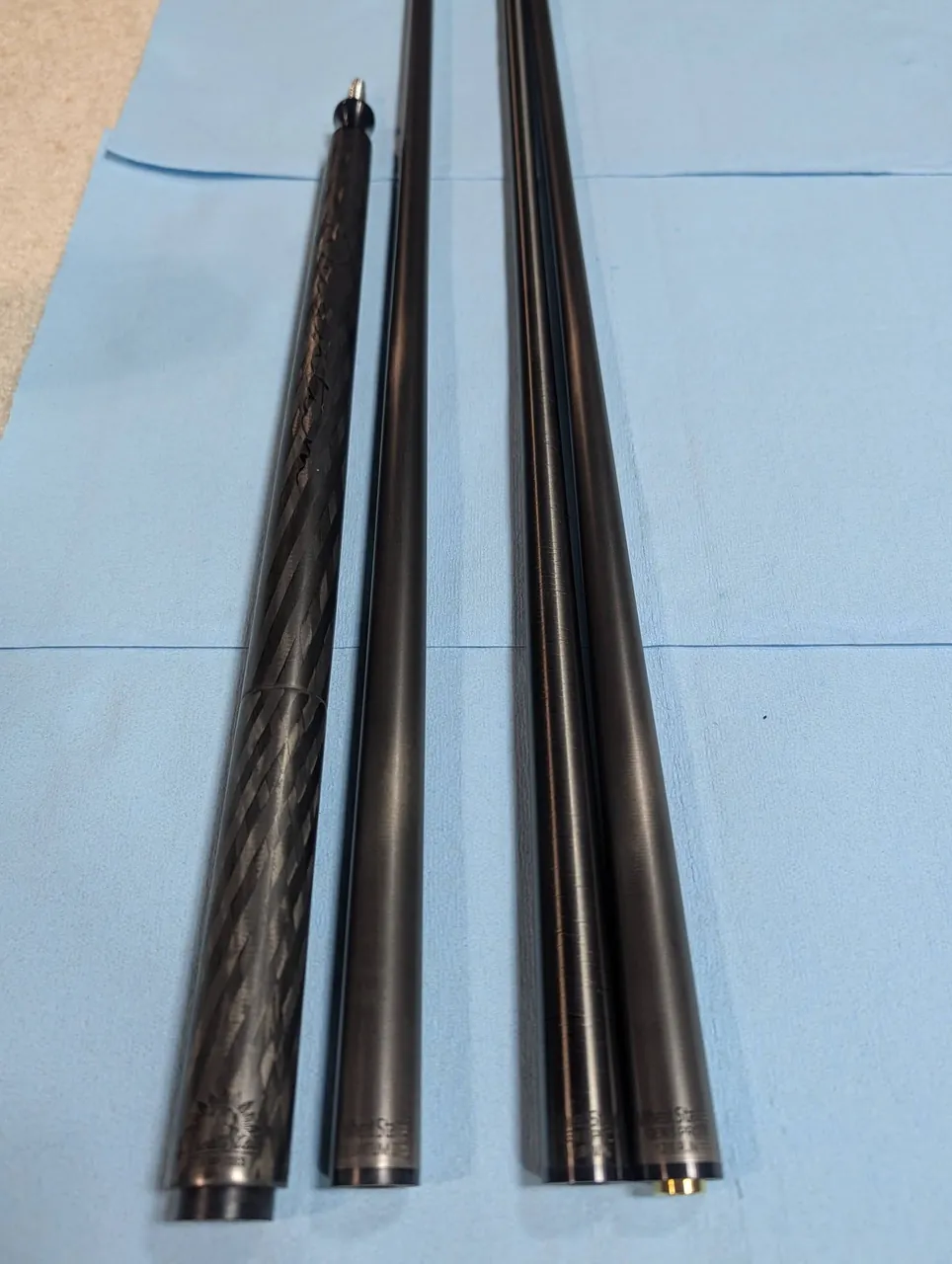 Wheat State Cues Gen 5 Core carbon shaft lineup with colored joint details.